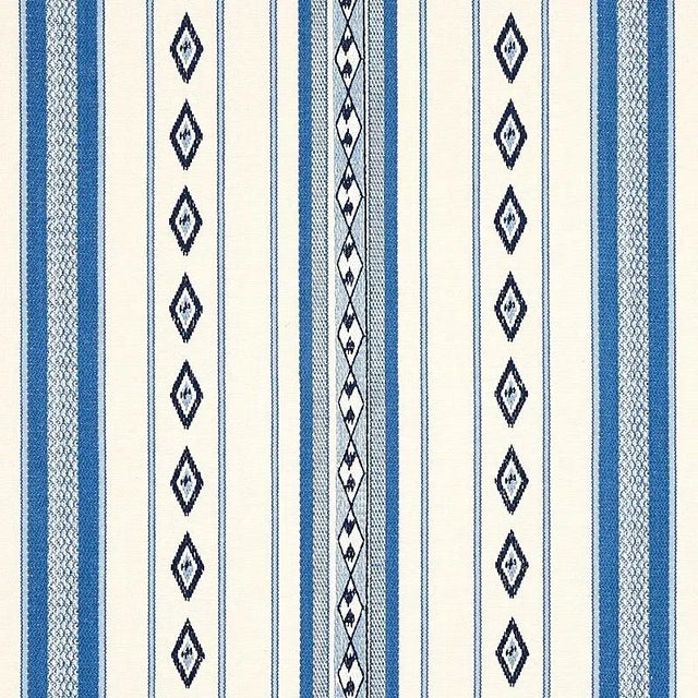 This medium-scale woven Cotton stripe recalls wide open skies and desert vistas. A combination of weaving and embroidery...