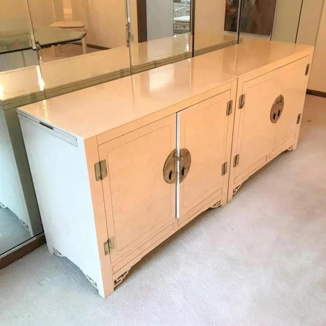 An Asian inspired server by White Furniture of Mebane, North Carolina, USA. Solid lacquered mahogany with brass hardware,...