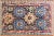 This is a particularly lively and unusual example. The field is organized around large, strongly drawn geometric floral...