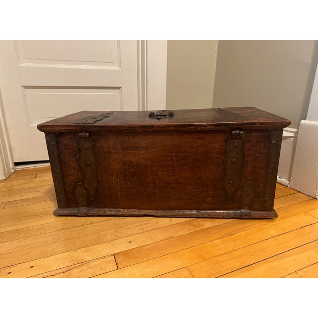 17th Century Hand Hewn Storage Box With Hand Hammered Iron Details. Sturdy and sound with a rich, warm 300+ year patina....