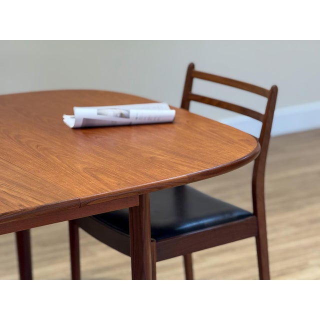 Extending Dining Table in Teak from G-Plan, 1960s, in Flawless conditions. Designed 1960 to 1969 This piece has an...