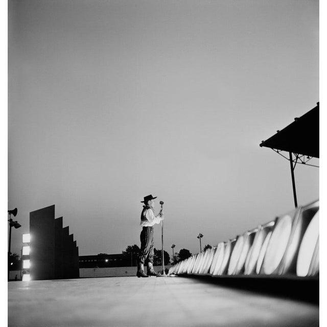 Lone Singer A male singer performs on stage, 1949. (Photo by Gould/Graphic House/Archive Photos/Getty Images) Paper size:...