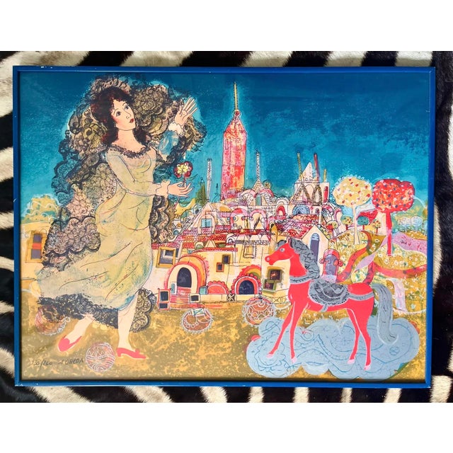 Signed and numbered original lithograph is by Augustin Ubeda entitled "La Jeune Princesse." Framed in painted blue metal....