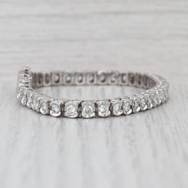 Gemstone Information: - Natural Diamonds - Total Carats - 4.70ctw Cut - Round Brilliant Color - F - H Clarity - SI1 - SI2...