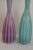 Pair of Italian Murano vases with cranberry, turquoise and opaque colors. The smaller (cranberry/opaque) vase measures...