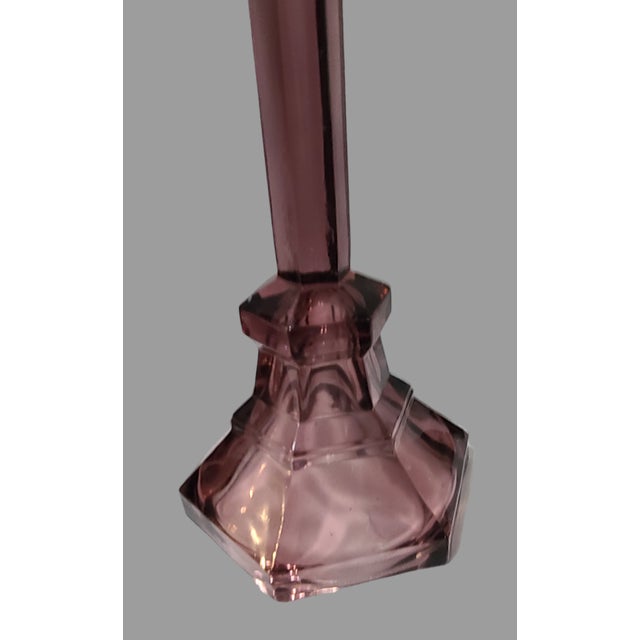 Add a touch of vintage elegance to your home decor with this beautiful pair of candlesticks. Crafted from high-quality...