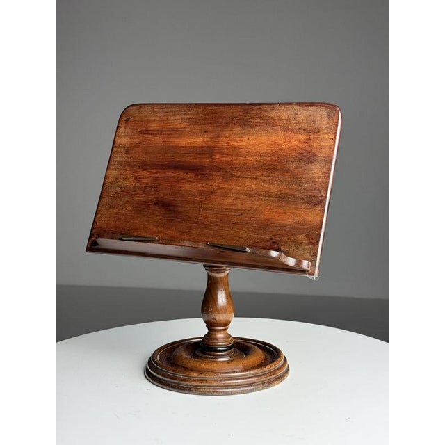 Solid mahogany bookstand/book holder. Originating in England, 19th century. Adjustable to your liking. Dimensions: 33W x...