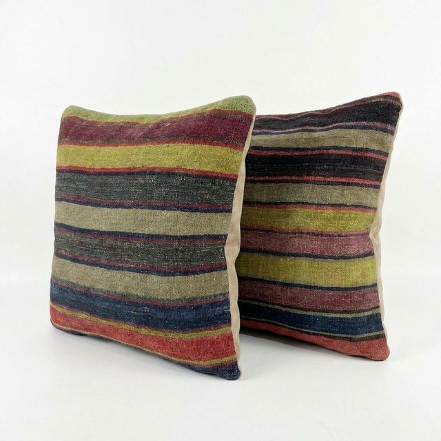 This beautiful 24'' X 25'' pillow cover set was made from authentic Turkish Kilim pieces. Bright colors of wool adorn the...
