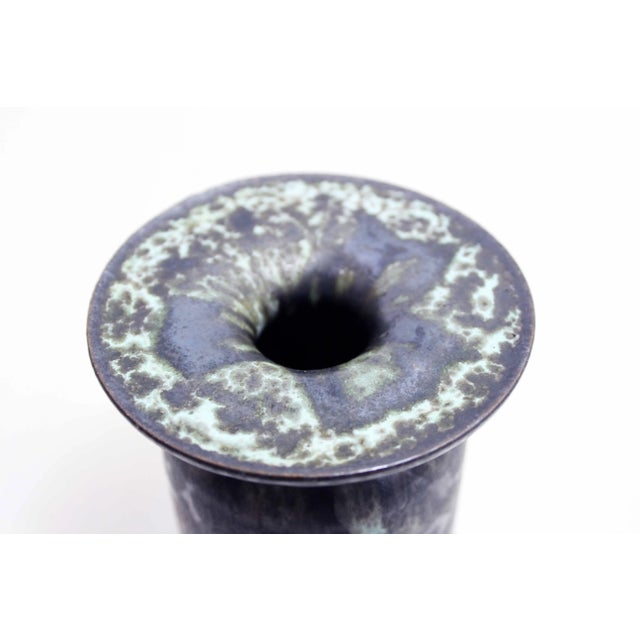 Very nice vase by Ralf Unterstab Made in East Germany in the 50s and 60s, this lava glaze vase offers a beautiful design....