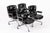 These vintage mid century modern black Model 3475 Eames Time Life Lobby Chairs designed by Charles & Ray Eames for Herman...