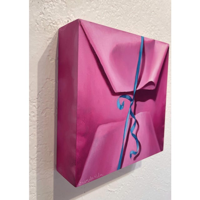 Abstract Pink Package by Sarah van der Helm | Oil on Cradled Panel close-up of a pink gift wrapped with blue ribbon For Sale - Image 3 of 4