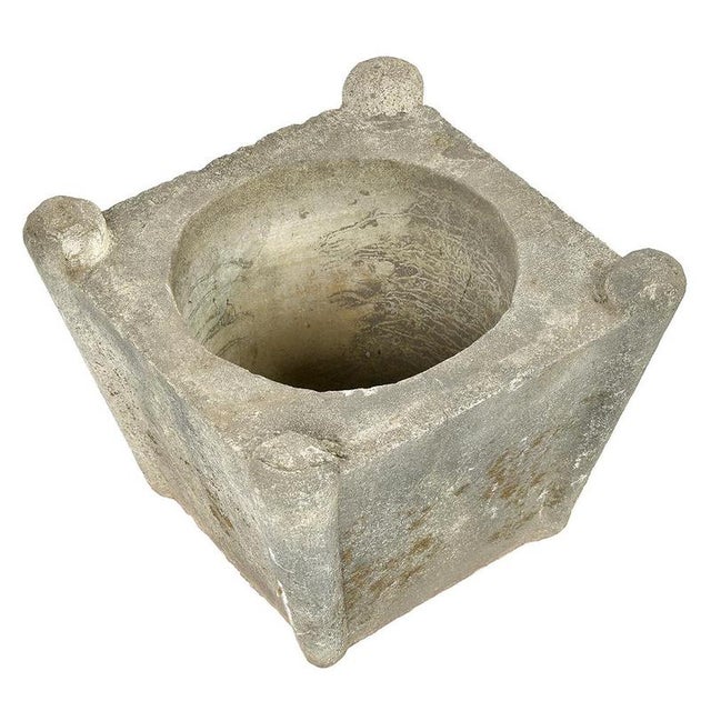 This stone planter, measuring 47 cm in height, 60 cm in width and 60 cm in depth, embodies both the robustness and finesse...