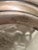 This is a heavy dimple pinch bottle with Sterling overlay at top and down sides. along with a Sterling cap (with intact...