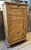 Antique pine pantry cupboard with nice molded panel doors. There are two very unusual drop front doors. Circa 1880. The...