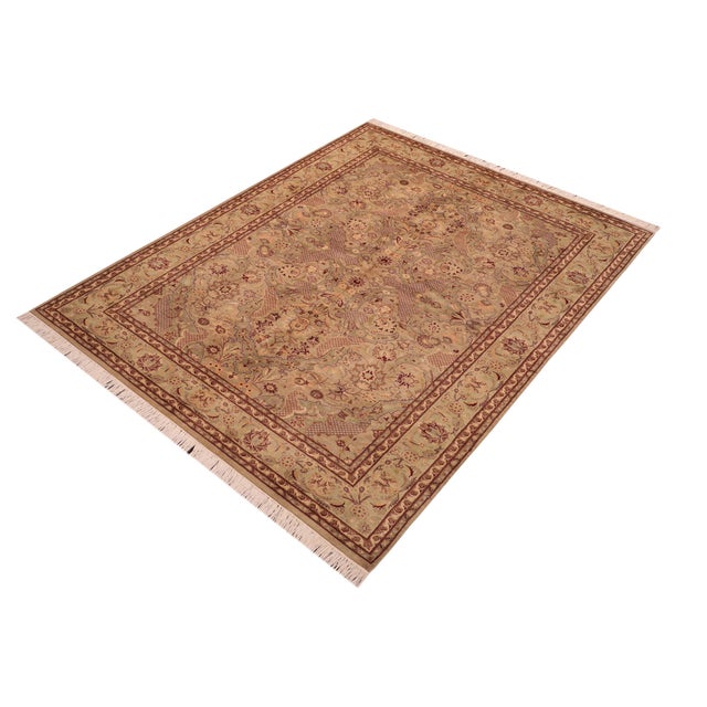 Designed with mesmerizing intricacy and gorgeous color palette, this hand-knotted masterpiece demonstrates the beauty and...