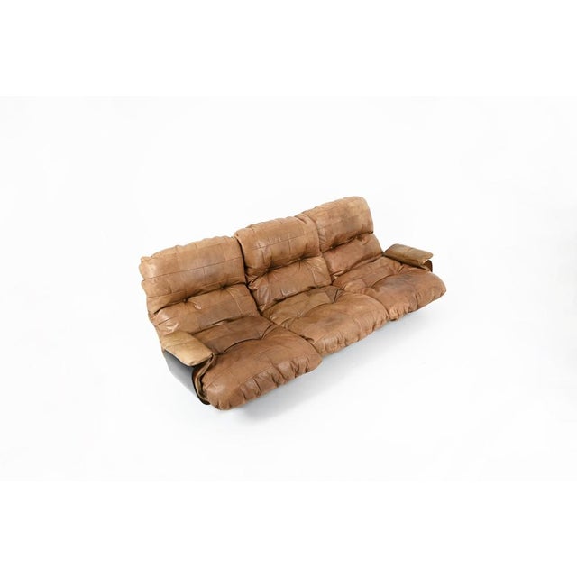 Brown leather sofa with an acrylic glass shell by Michel Ducaroy. Manufactured by Ligne Roset. Model: Marsala. Seat...