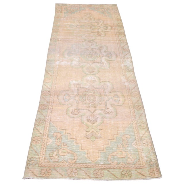 Hand-knotted with care using traditional rug-making techniques, this wool rug blends timeless craftsmanship with a modern...