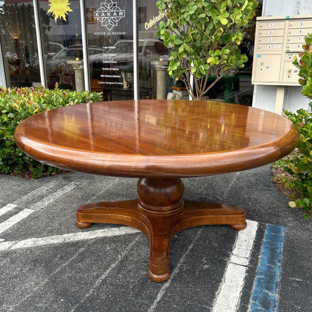 Solid sturdy rounded edge thick wood dining table. The natural wood grain is visible throughout the entire design of the...