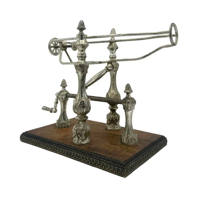 This vintage mechanical wine pourer was designed to provide precise control when decanting and serving fine wines. Crafted...