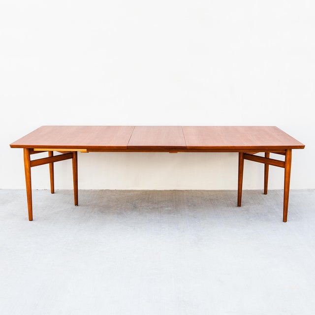 Arne Vodder Model 201 extendable dining or conference table in teak, produced in Denmark by Sibast Furniture c. mid 1960s....