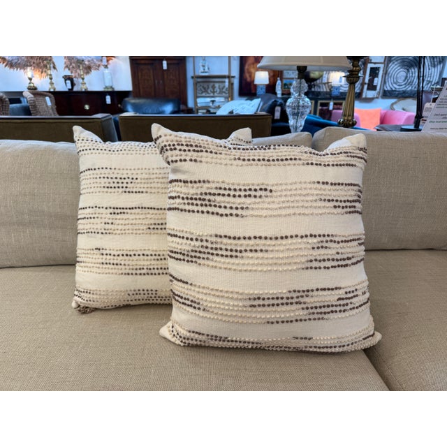 Design Plus Gallery presents a Pair of Pryce Throw Pillows from Serena & Li.ly. The pillow s have petite French knots...
