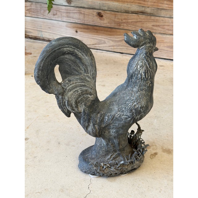 A charming vintage French-style cast iron rooster garden statue featuring a beautifully weathered patina and hand-crafted...