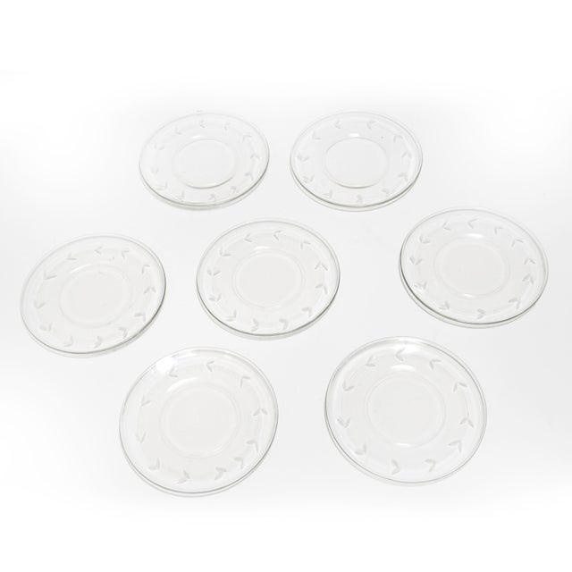 Enjoy this elegant and whimsical set of 7 vintage etched glass plates with an elegant, lightweight feel and beautifully...