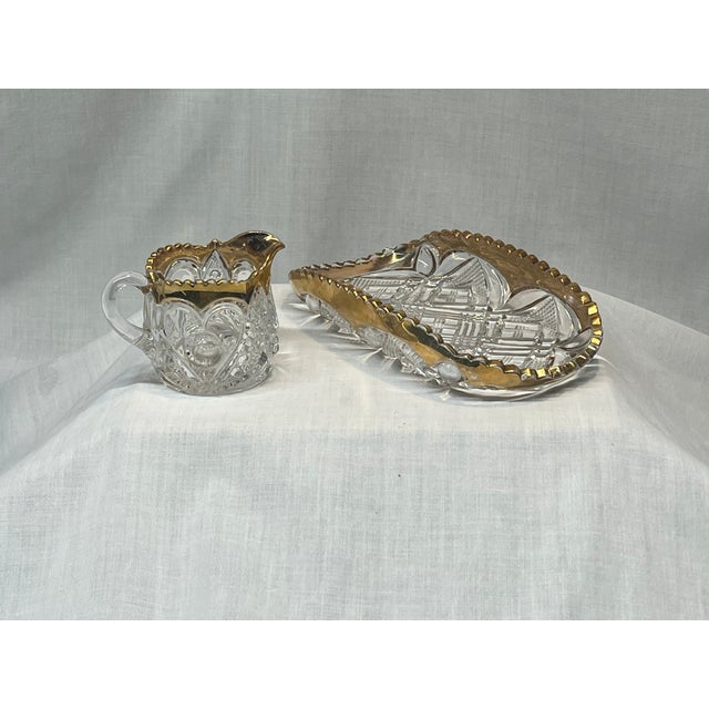 Add a touch of late-Victorian romance to your tabletop or hutch with this stunning 2-piece set of Early American Pattern...