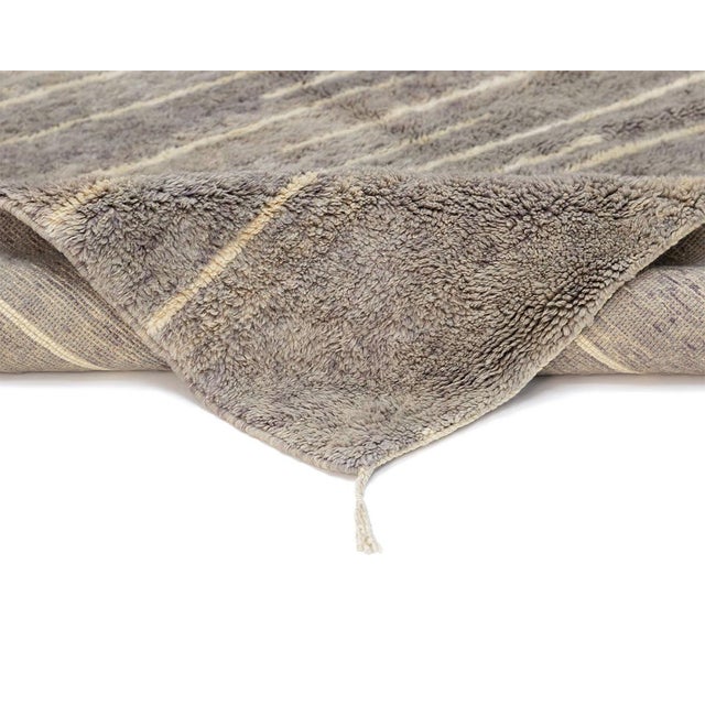 Refined hand-knotted wool rug with Ivory linear patterns in shades of Vintage Violet, Misty Taupe, and Velvet Fawn,...