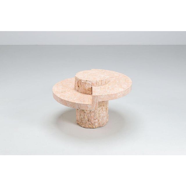 Magnussen Ponte coffee table in Mactan stone, Belgium, 1970. A striking sculptural design crafted from pale pink Mactan...