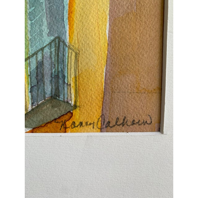 Signed original watercolor of an alley scene in vibrant yellow, blue, purple washes.
