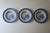 An English set of three (3) cobalt‑blue and off‑white ironstone soup plates, in a Chinoiserie landscape pattern, by W. T....