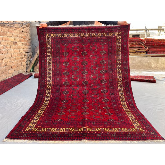 A finely hand-knotted Afghan Khal Mohammadi rug — the premium Ersari Turkmen weave from northern Afghanistan, prized for...