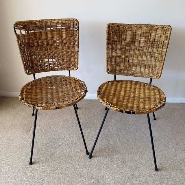 Wow! Here we have a pair of great-looking, richly textured woven wicker chairs. Could possibly be an early version of or a...