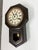Design Plus Gallery presents an Antique Octagonal Drop Wood Wall Clock. This clock has an octagonal wood case, a round...