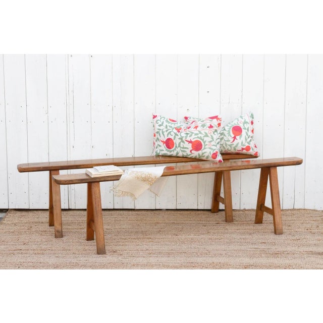 These charming French fruitwood benches date back to the early 20th century and come as a pair. This set of 2 French...
