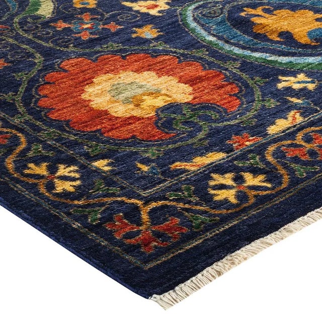 The meticulous art of hand-embroidered textiles from Uzbekistan tribes inspired the Suzani Collection of rugs. Bold...
