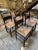 A beautiful set of 4 Hitchcock antique side chairs, reproduced. Natural wicker seating, you can add a thin upholstered...