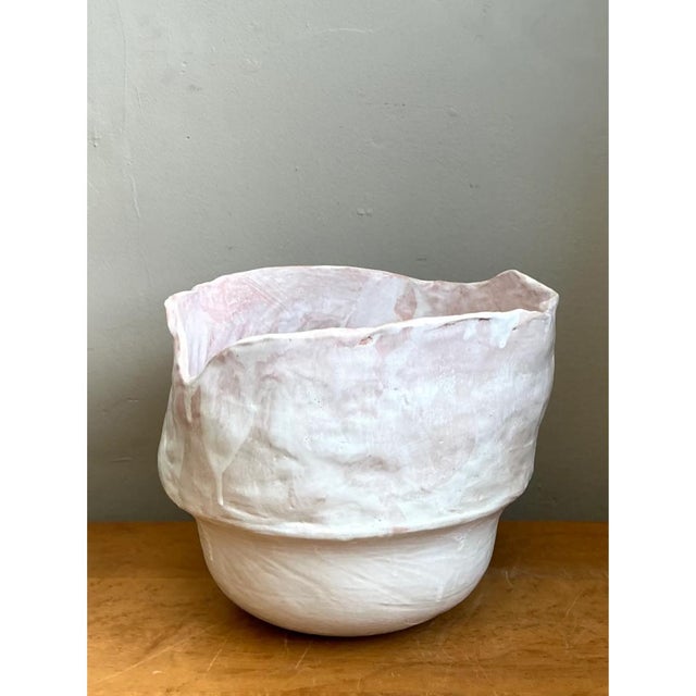 This vintage monumental handcrafted ceramic vessel showcases a distinctive organic form, beautifully embodying the...