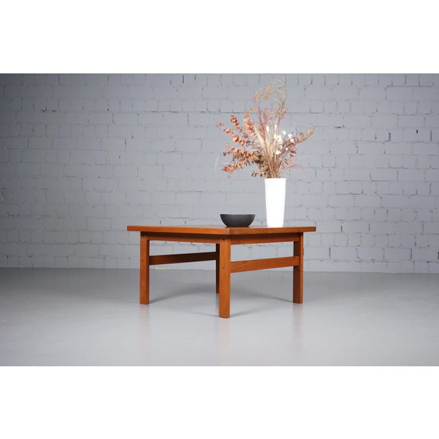 Solid Teak Coffee Table by Niels Bach, 1970s, in Very Good conditions. Designed 1970 to 1979 This piece has an attribution...