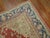 Early 20th-century Turkish Oushak rug with a medallion and border pattern on a red field Measures: 8'9" x 11'9".