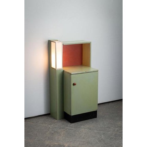 1920s Modernist Cabinet with Lamp I have official proof of authenticity such as vintage catalogs, designer records, or...
