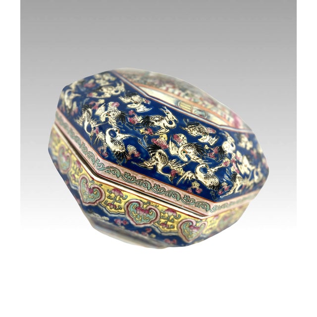 A sizeable, heavy and rather magnificent hand painted antique porcelain covered bowl/container from China. Hand decorated...