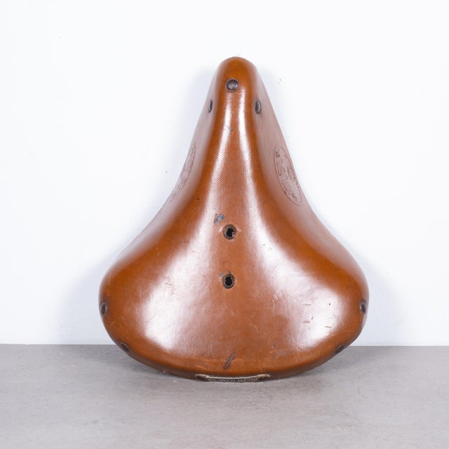 ABOUT Vintage leather bicycle seats from Italy and France with original labels. CREATOR A. Wolber, Italia. DATE OF...