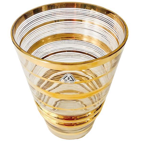 A beautiful Art Deco Booms vase made by Rupel, featuring a richly graphic gold finish from the 1930s. This Art Deco vase...