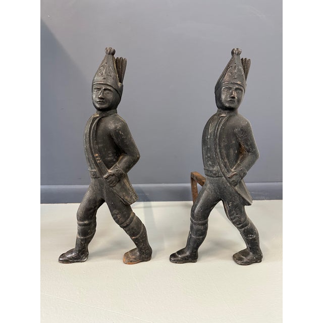 Add a touch of history and elegance to your fireplace with this pair of 19th Century Hessian Soldiers Antique Andirons....