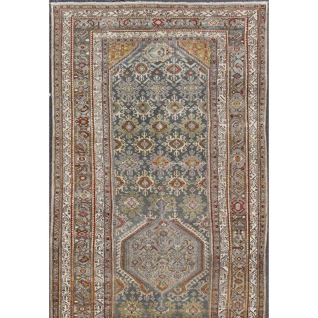 Measures: 6'9 x 16'8 Antique Persian Malayer Gallery Rug with Medallion and Rosette Design. Keivan Woven Arts/...