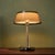 The Tuomas table lamp was designed by Yki Nummi for Stockmann-Orno in Finland during the 1950s. It is constructed from...