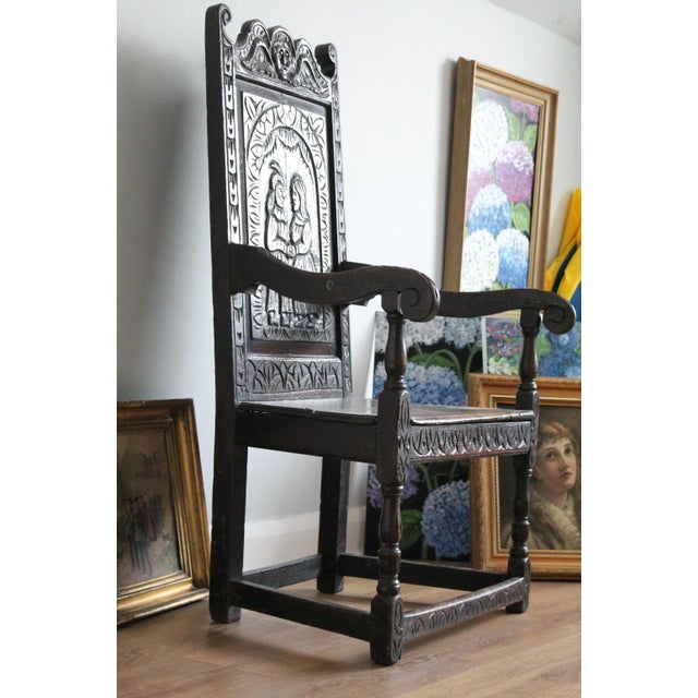 A rather fine carver dining chair or arm chair possibly dating to the 17th Century though it may be later. Possessing all...