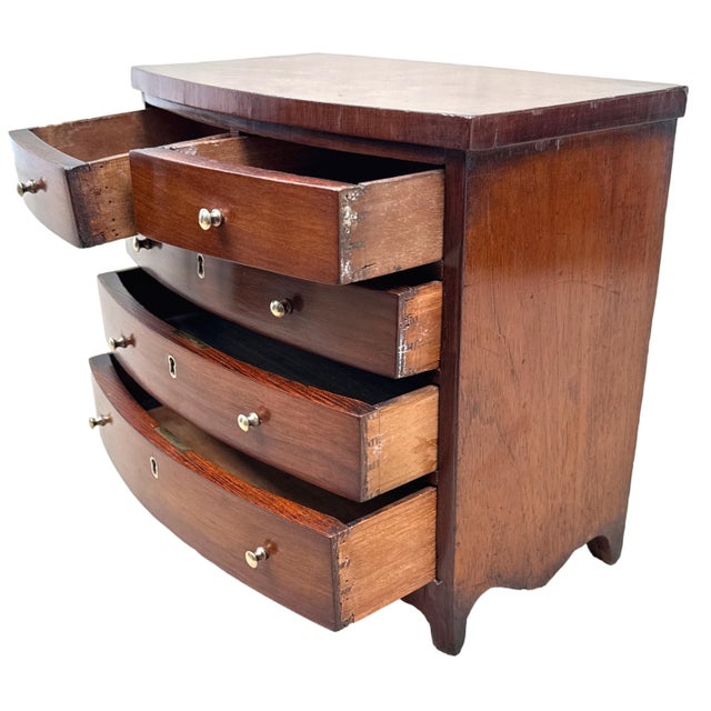 A 19th Century Victorian Period Mahogany Miniature Chest Of Drawers, Of Attractive Bowfronted Form, Having Well Figured...